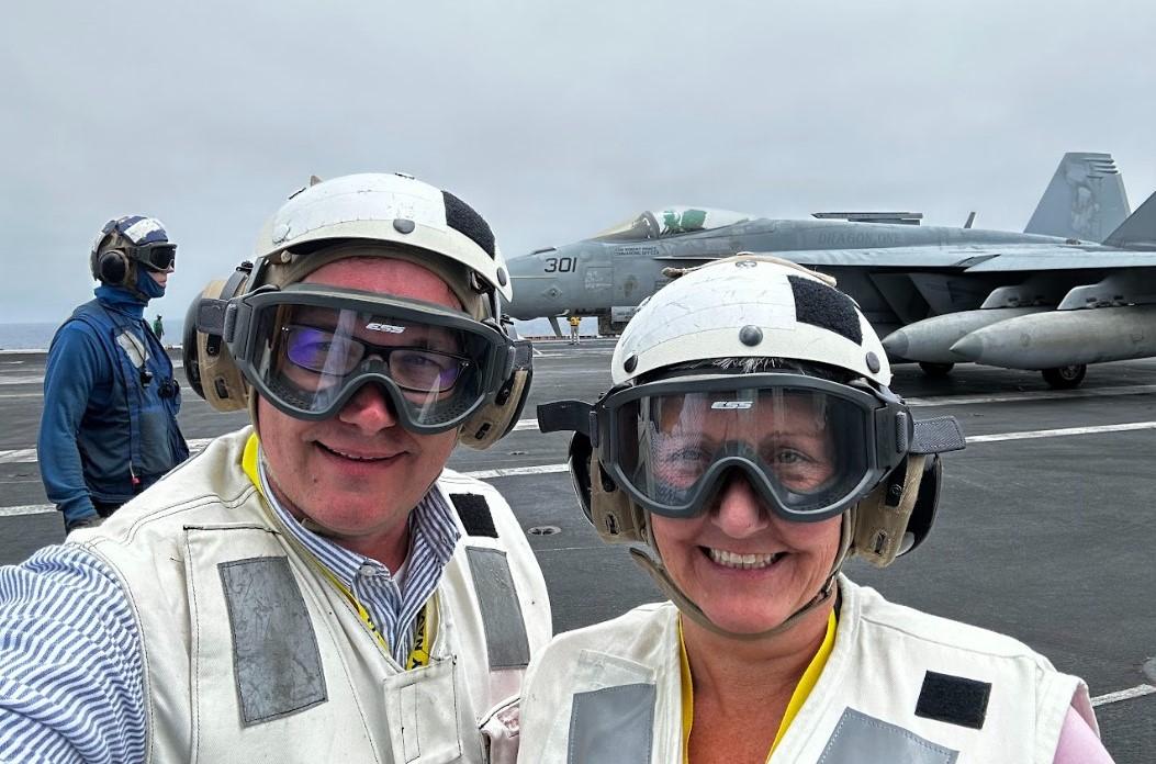 Professors Noah Zerbe and Alison Holmes, Distinguished Visitors on the aircraft carrier USS Carl Vinson